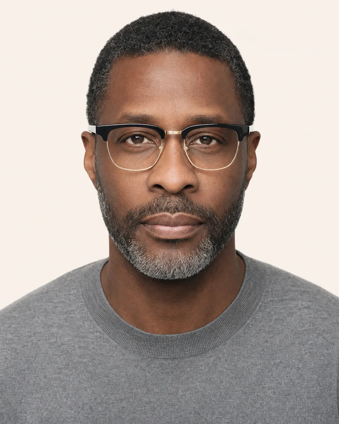 Model wearing browline glasses, front view